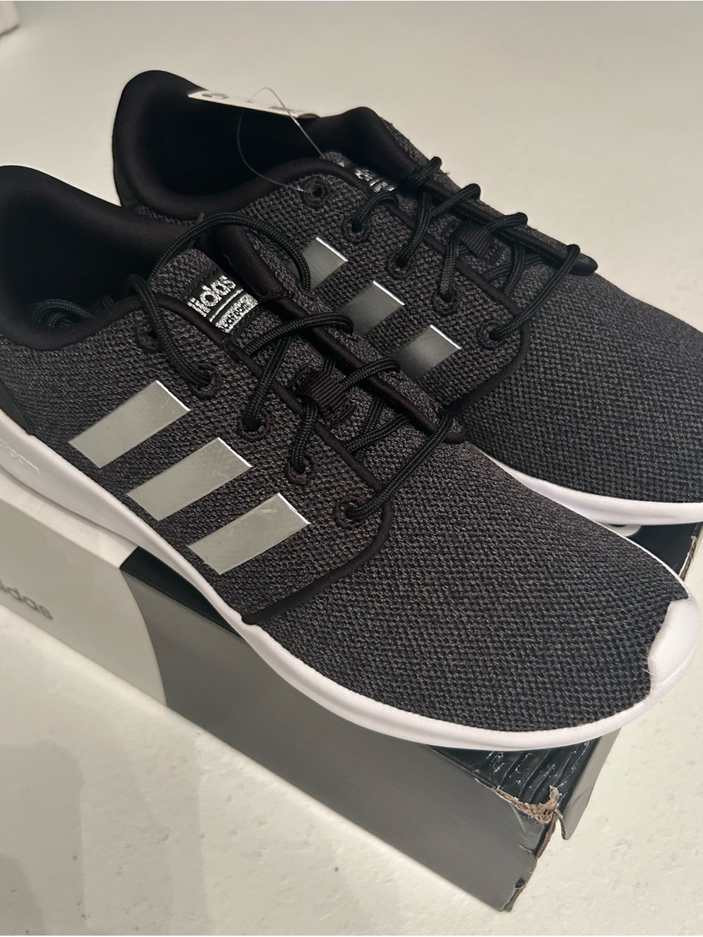 adidas Women’s Black Knit Sneakers with Silver Stripes